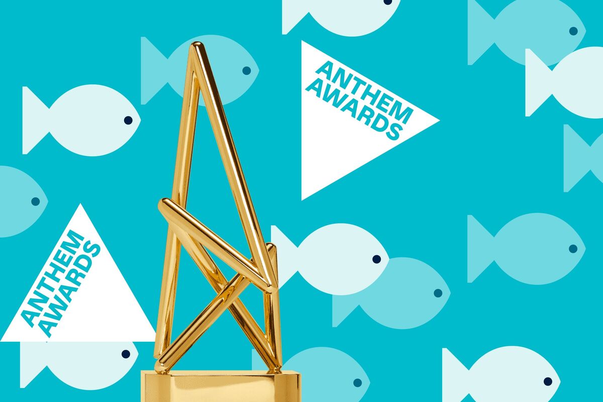 Gold Anthem Award surrounded by fish